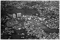 Aerial view of houses and high-rises on the outskirts of the city. Ho Chi Minh City, Vietnam (black and white)