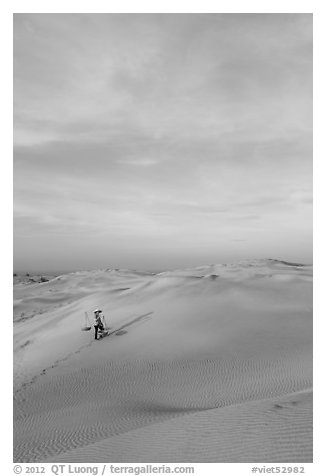 Sand dune landscape with figure. Mui Ne, Vietnam (black and white)