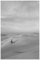 Sand dune landscape with figure. Mui Ne, Vietnam (black and white)