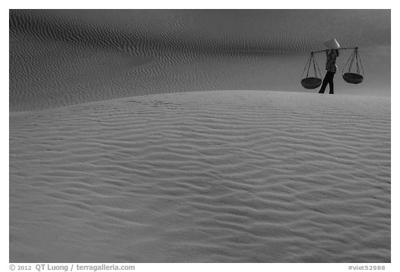 Typical vietnamese figure on Mui Ne dunes. Mui Ne, Vietnam