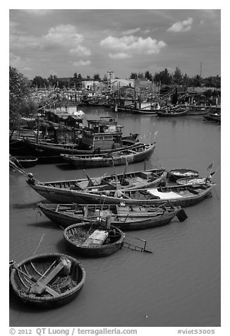 Fishing boats along river, Phan Thiet. Vietnam (black and white)