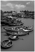 Fishing boats along river, Phan Thiet. Vietnam (black and white)