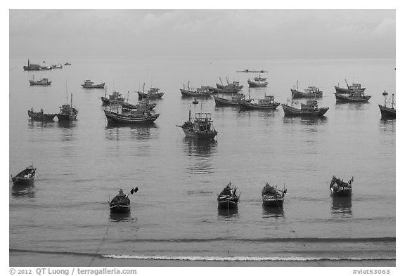 Fishing boats moored at the fishing beach. Mui Ne, Vietnam (black and white)