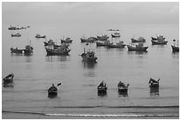 Fishing boats moored at the fishing beach. Mui Ne, Vietnam (black and white)