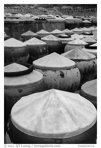 Fish sauch being aged in vats. Mui Ne, Vietnam