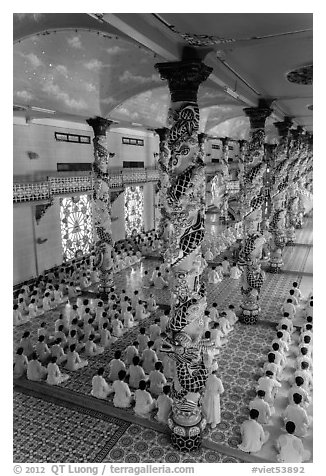 Ceremony inside Great Temple of Cao Dai. Tay Ninh, Vietnam (black and white)