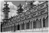 Sideways view of Great Temple of Cao Dai. Tay Ninh, Vietnam (black and white)