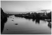 River and homes at sunset. Mekong Delta, Vietnam ( black and white)