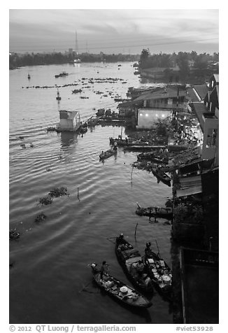Boats and riverfront from above at dawn. Can Tho, Vietnam (black and white)