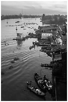 Boats and riverfront from above at dawn. Can Tho, Vietnam (black and white)