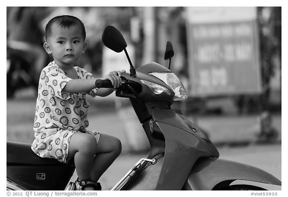 Boy on scooter. Can Tho, Vietnam (black and white)
