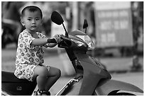 Boy on scooter. Can Tho, Vietnam ( black and white)