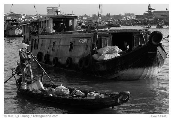 Canoe and barge, Cai Rang floating market. Can Tho, Vietnam