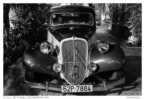 Old Citroen car in garden. Ho Chi Minh City, Vietnam