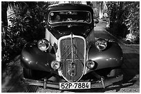 Old Citroen car in garden. Ho Chi Minh City, Vietnam (black and white)