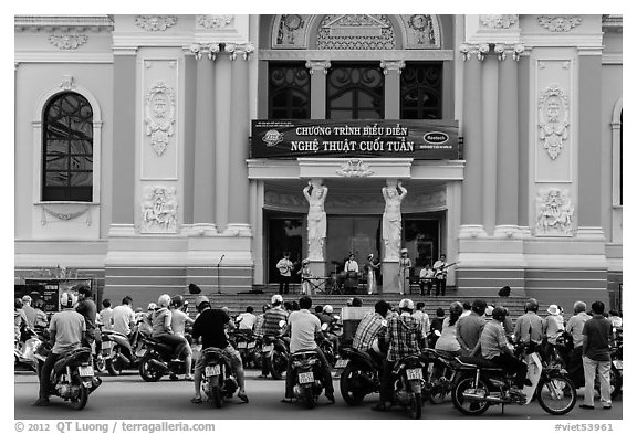 Tradionnal music performance outside municipal opera house. Ho Chi Minh City, Vietnam (black and white)