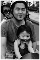 Family on motorbike with sunglasses. Ho Chi Minh City, Vietnam (black and white)