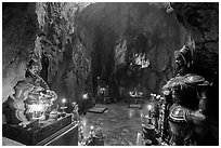 Guardian deities at the entrance of Huyen Khong cave. Da Nang, Vietnam (black and white)