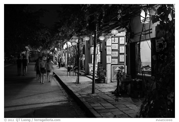 Street lined with art galleries by night. Hoi An, Vietnam