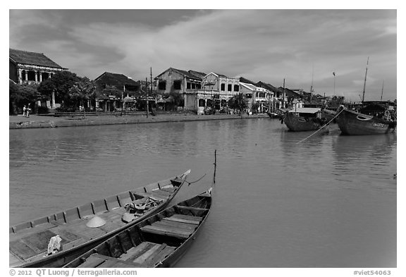 Boats, Thu Bon River, and houses. Hoi An, Vietnam (black and white)