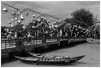 Cam Nam bridge with lanterns. Hoi An, Vietnam (black and white)