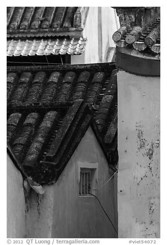 Roofs and blue walls detail. Hoi An, Vietnam (black and white)