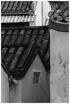 Roofs and blue walls detail. Hoi An, Vietnam (black and white)