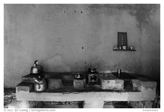Yellow kitchen and altar. Hoi An, Vietnam (black and white)