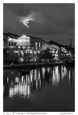 Ancient townhouses and moon reflected in river. Hoi An, Vietnam (black and white)