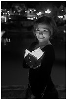 Young woman with candle box. Hoi An, Vietnam (black and white)