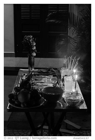 Curbside altar at night. Hoi An, Vietnam (black and white)