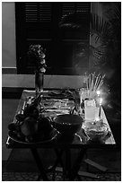 Curbside altar at night. Hoi An, Vietnam (black and white)