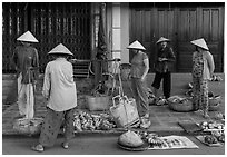 Curbside fruit vendors. Hoi An, Vietnam (black and white)