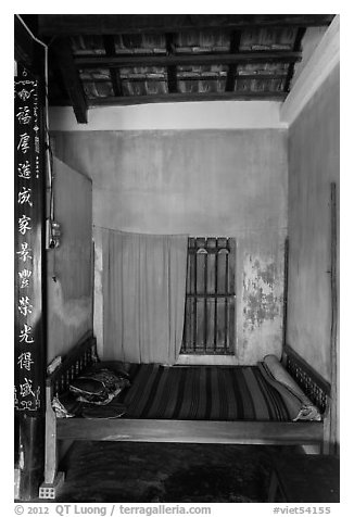 Wooden bed with straw mat, Cam Kim Village. Hoi An, Vietnam (black and white)