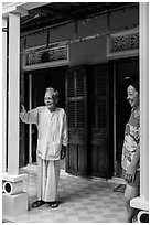 Woman and elder on porch of their house, Cam Kim Village. Hoi An, Vietnam ( black and white)