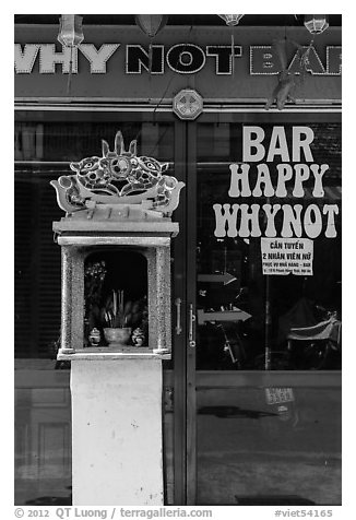 Curbside altar in front of bar. Hoi An, Vietnam (black and white)