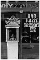 Curbside altar in front of bar. Hoi An, Vietnam (black and white)