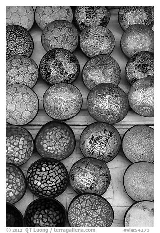 Close up of decorated bowls. Hoi An, Vietnam (black and white)