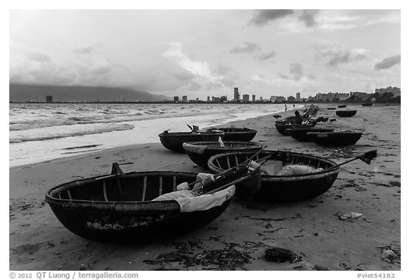 Coracle boats and city skyline. Da Nang, Vietnam