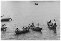 Fishermen on small boats. Vietnam (black and white)
