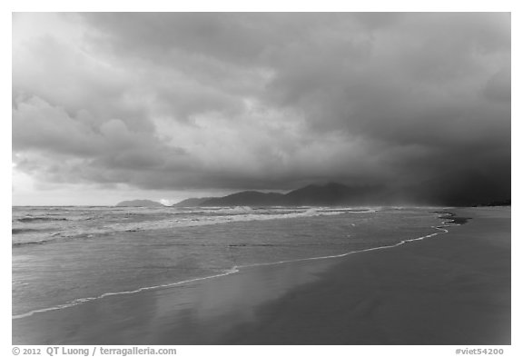 Stormy sunrise on beach. Vietnam