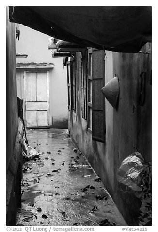 Alley and rain. Vietnam (black and white)