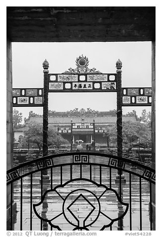 Palace of Supreme Peace viewed from gate in the rain. Hue, Vietnam (black and white)
