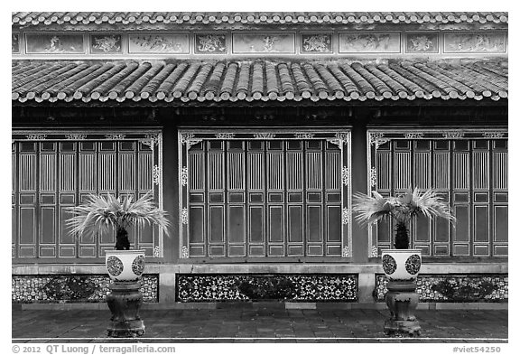 Facade with red and golden doors, imperial citadel. Hue, Vietnam (black and white)