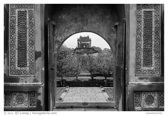 Stele Pavilion seen through the tomb gate, Tu Duc Tomb. Hue, Vietnam (black and white)