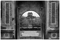 Stele Pavilion seen through the tomb gate, Tu Duc Tomb. Hue, Vietnam (black and white)