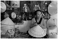 Woman in hat-making workshop. Hue, Vietnam ( black and white)