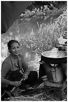 Woman cooking canalside, Thanh Toan. Hue, Vietnam (black and white)