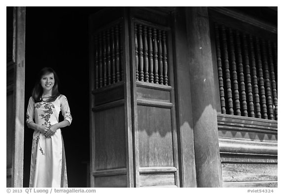 Woman in doorway, Temple of the Litterature. Hanoi, Vietnam (black and white)