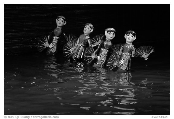 Water puppets (4 characters with fans), Thang Long Theatre. Hanoi, Vietnam (black and white)